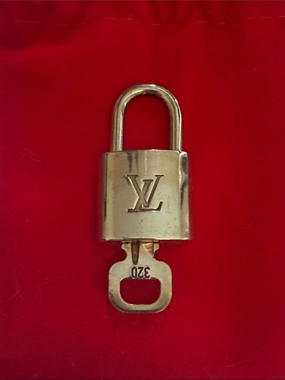 #320 Louis Vuitton Gold-tone Padlock with Key
